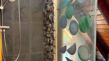 Eco-friendly toiletries, hair dryer, towels, soap