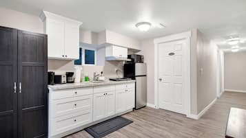 Fridge, microwave, stovetop, coffee/tea maker