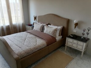 2 dormitorios, tabla de planchar con plancha, wifi y ropa de cama