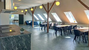 A modern interior with a dining area, a pool table, and a reception desk. - Beautiful home in Brørup with WiFi (Brørup)