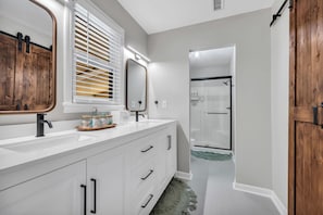 Shower, jetted tub, hair dryer, towels