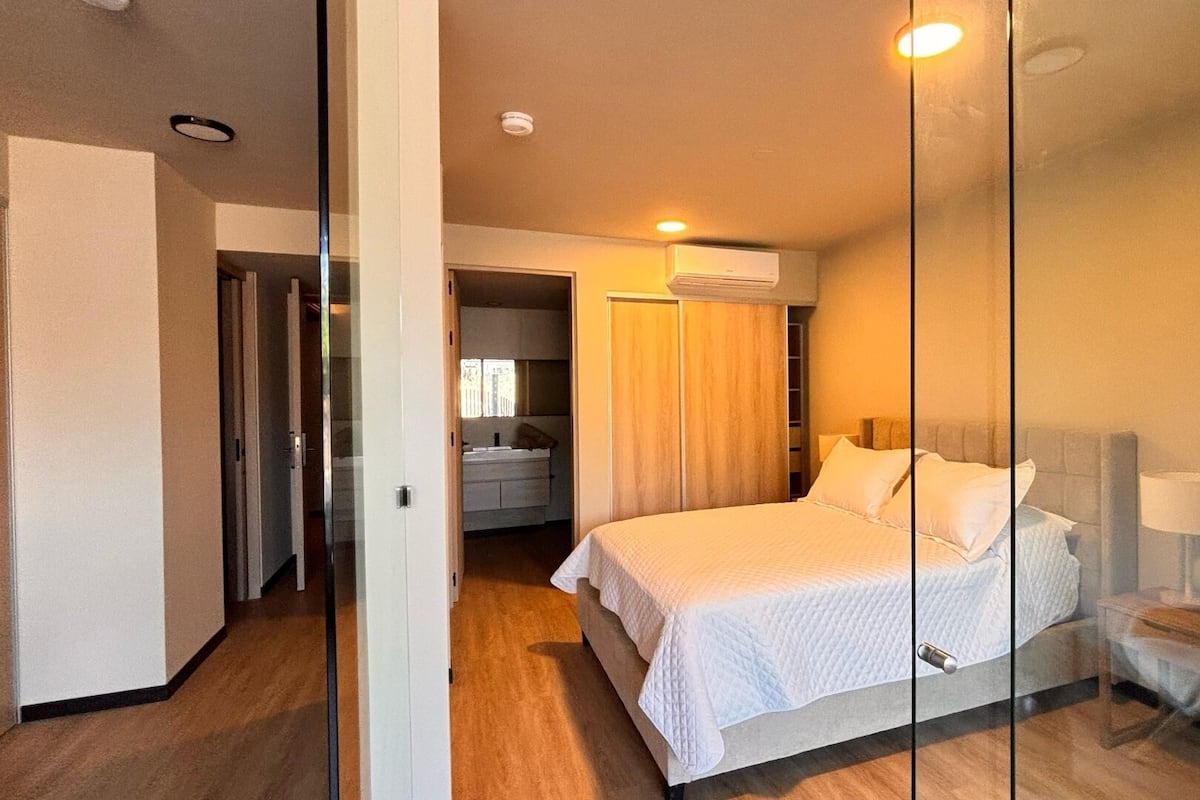 1 bedroom, premium bedding, blackout drapes, soundproofing