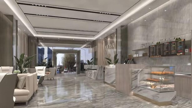 A modern hotel lobby with marble flooring, a reception desk, seating area, and a glass display case with pastries. - Meidi Hotel (Shenzhen Bao'an Airport Pingluanshan Metro Station Branch) (Shenzhen)