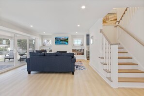 Maison, plusieurs lits, cheminée, vue jardin (BEACH AVENUE 23) | Coin séjour