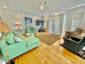 Casa, letti multipli, cucina, vista giardino | Area soggiorno