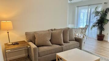 Condo, Multiple Beds, Kitchen, Garden View (OLIVE AVENUE 1B) | Living area