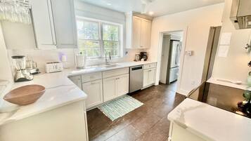 House, Multiple Beds, Fireplace, Garden View | Private kitchen