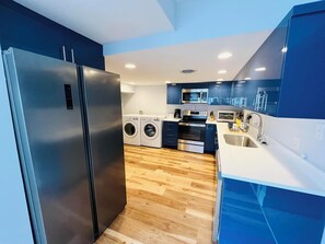 Huis, Meerdere bedden, keuken, uitzicht op tuin | Privékeuken | Een koffiezetapparaat/waterkoker