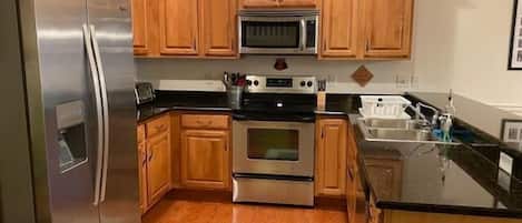 Townhome, Multiple Beds, Balcony, Garden View | Private kitchen | Coffee/tea maker