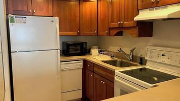 Condo, Multiple Beds, Balcony, Garden View | Private kitchen | Coffee/tea maker