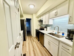 Townhome, Multiple Beds, Kitchen, Garden View | Private kitchen