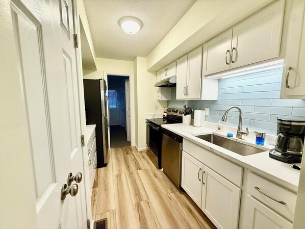 Townhome, Multiple Beds, Kitchen, Garden View | Private kitchen | Coffee/tea maker