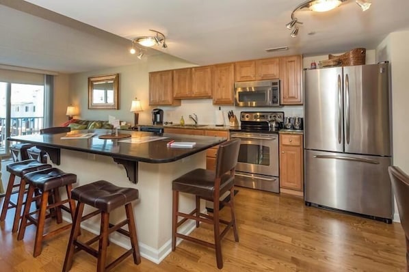 Condo, 1 King Bed with Sofa bed, Balcony, Garden View | Private kitchen | Coffee/tea maker