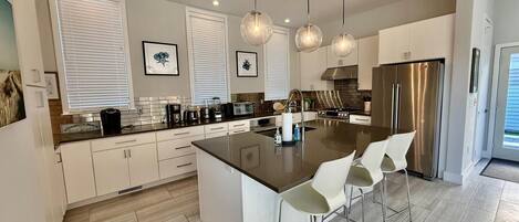 บ้านพัก, หลายเตียง, ใช้สระว่ายน้ำได้, วิวสวน | ครัวส่วนตัว | เครื่องชงกาแฟ/ชา