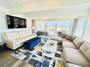 Ferienhaus, Mehrere Betten, Balkon, Gartenblick | Wohnbereich