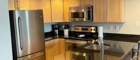 Condo, Multiple Beds, Kitchen, Garden View | Private kitchen | Coffee/tea maker