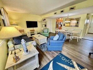 Maison, plusieurs lits, patio, vue jardin | Coin séjour