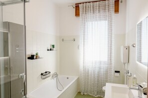 Shower, eco-friendly toiletries, hair dryer, bidet