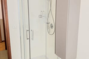 Shower, eco-friendly toiletries, hair dryer, bidet