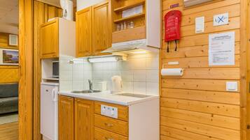 Fridge, microwave, cookware/dishes/utensils