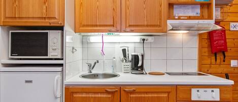 Fridge, microwave, cookware/dishes/utensils