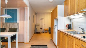 Fridge, microwave, cookware/dishes/utensils