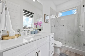 Shower, towels, soap, toilet paper
