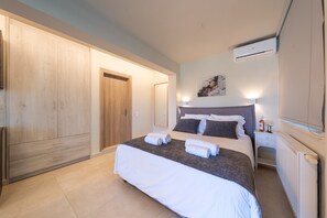 1 chambre, fer et planche Ă repasser, Wi-Fi gratuit, draps fournis