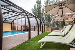 Alberca techada y alberca climatizada