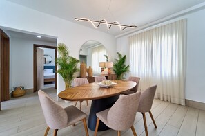 Deluxe Apartment, Balcony, Partial Ocean View | In-room dining