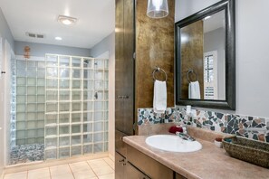 Shower, hair dryer, towels