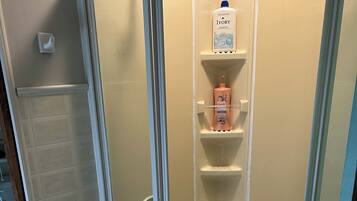 Shower, towels, soap, toilet paper