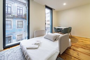 Iron/ironing board, travel crib, free WiFi, bed sheets