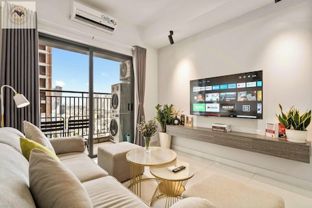Design Apartment, 2 Bedrooms, Balcony, City View | Living area | 42-inch flat-screen TV with cable channels