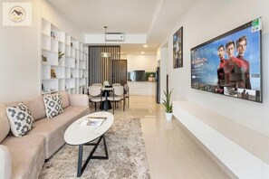 42-inch flat-screen TV with cable channels - SOHO Residences Penthouse Apartment (Ho Chi Minh City)