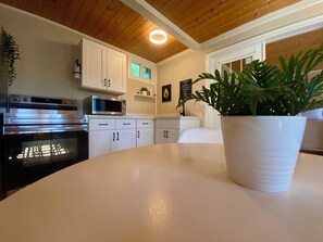 Superior Apartment, Kitchen, Pool View | Individually decorated, individually furnished, free WiFi, bed sheets - South Shore Suites (Bayfield)