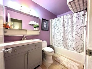 Hair dryer, towels, soap, toilet paper