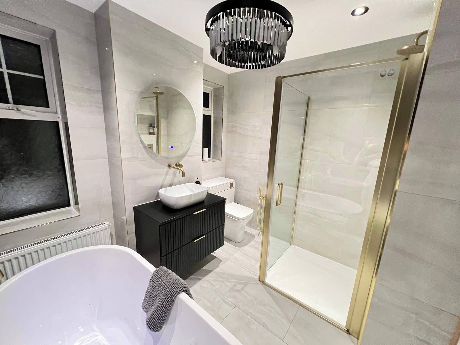 Shower, hair dryer, towels