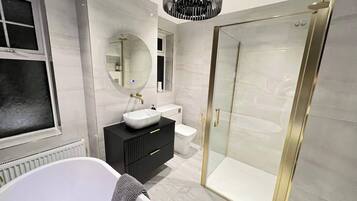 Shower, hair dryer, towels