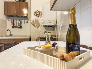 Fridge, microwave, oven, cookware/dishes/utensils