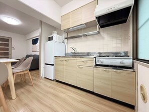 Fridge, microwave, stovetop, cookware/dishes/utensils