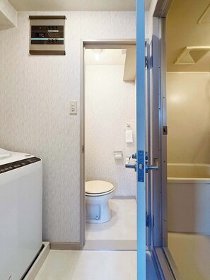 Dutxa, assecador de cabells i tovalloles 