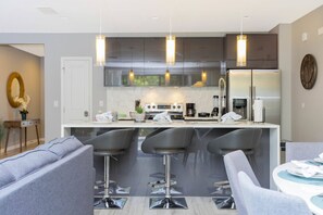 Fridge, microwave, oven, stovetop - Dream Stay Near Magic of Disney 4BD with Pool and BBQ (Kissimmee)