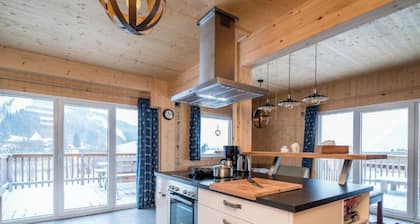 Stylish alpine chalet on the slopes with a sauna