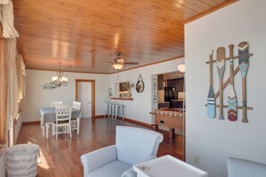 TV, table football - Steps to Mississippi River: Cozy Hot Tub Haven! (Le Claire)