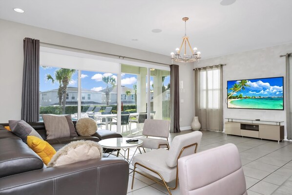 TV - Magnificent Home with Private Pool, Theater & Game Room near Disney with Waterpark & Resort Access. (Kissimmee)