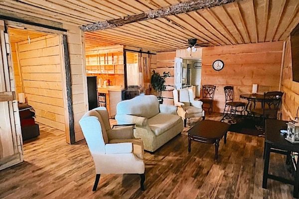 Upstairs Suite | Living room | 32-inch Smart TV with cable channels, foosball
