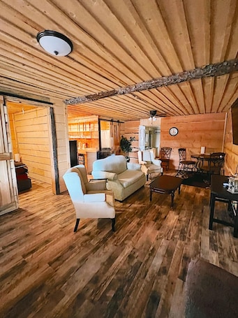 Upstairs Suite | Living room | 32-inch Smart TV with cable channels, foosball