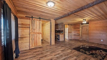 Upstairs Suite | Living room | 32-inch Smart TV with cable channels, table football