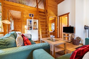 Una televisión, una chimenea, un reproductor estéreo